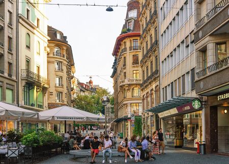 Geneva, Switzerland - August 30, 2016:  People at Place Longemalle Square in Geneva city center, Switzerlandのeditorial素材
