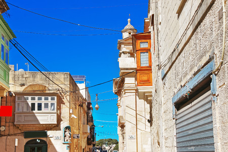 Rabat, Malta - April 4, 2014: Traditional architecture of buildings in the street in Rabat, Maltaのeditorial素材
