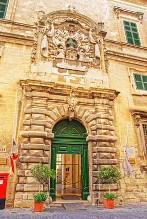 Valletta, Malta - April 1, 2014: Facade of Auberge Italy in Valletta old town, Maltaのeditorial素材