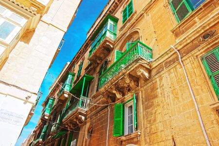 Houses with green balconies at Valletta old town, Maltaの写真素材