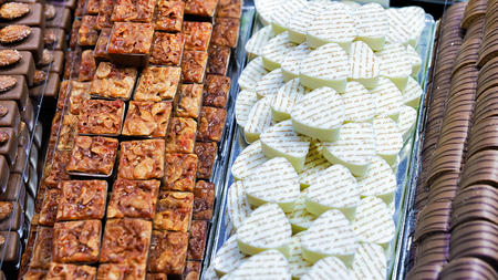 Zurich, Switzerland - September 2, 2016: Collection of milk and white Swiss chocolate praline sweetsのeditorial素材