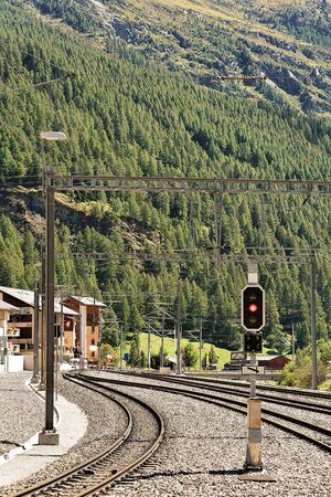 Railway train station and landscape in Zermatt, Valais in  Switzerland.の写真素材
