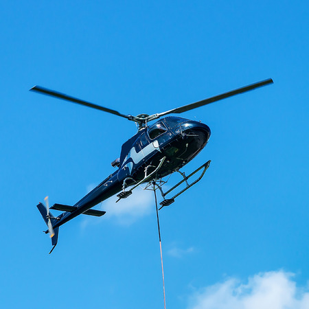 Helicopter flying in the sky at Lavaux, Lavaux-Oron district, Switzerland