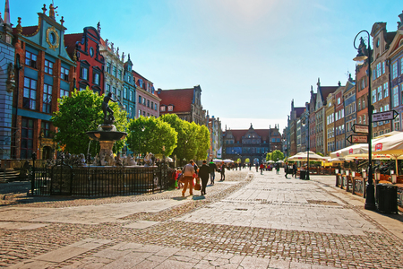 Gdansk, Poland - May 8, 2014: People at Neptune Monument at Long Market Square in the old city center of Gdansk, Polandのeditorial素材