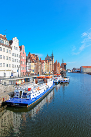Gdansk, Poland - May 8, 2014: Ferry boats at Waterside of Motlawa River of Gdansk, Poland. People on...