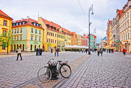 Wroclaw, Poland - May 3, 2014: Bicycle at the Market Square in Wroclaw, Poland. People on the backgroundのeditorial素材