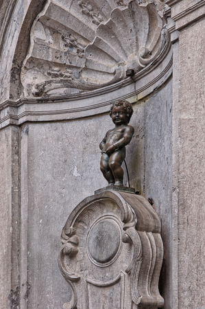 Brussels, Belgium - May 11, 2012: Little man Pee fountain statue in Brussels, capital of Belgium.のeditorial素材