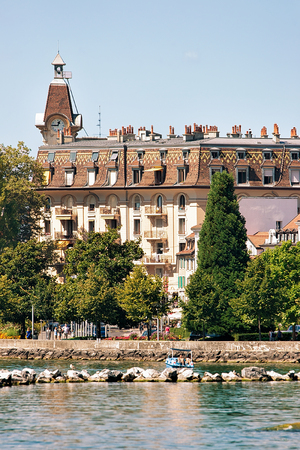 Touristic Information center building in Ouchy fishing village at Lake Geneva in Lausanne, Switzerland. People on the backgroundの写真素材