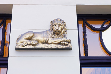 Poznan, Poland - May 6, 2014: Lion Statue as decoration on the building in the old town of Poznan, Polandのeditorial素材