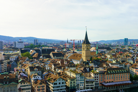 St Peter Church and rooftops at Limmatquai in the city center of Zurich, Switzerland.の写真素材