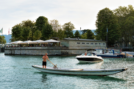 Zurich, Switzerland - September 2, 2016: Man in a boat in Zurich Lake, Switzerlandのeditorial素材