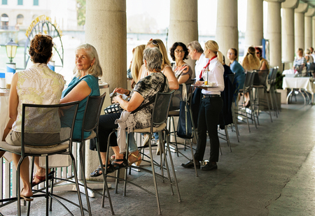 Zurich, Switzerland - September 2, 2016: People sitting at the street cafe at Limmat quay in the old city center of Zurich, Switzerlandのeditorial素材