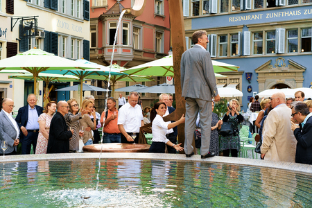 Zurich, Switzerland - September 2, 2016: People and fountain at Munsterhof square, Zurich, Switzerlandのeditorial素材