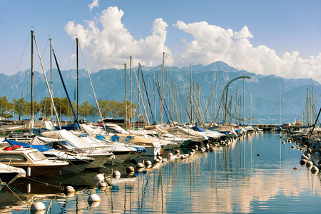 Marina with yachts at Lake Geneva in Lausanne, Ouchy fishing village, Switzerlandの写真素材