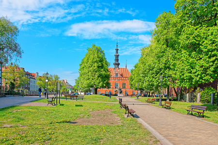 Sculpture of Jan Heweliusz in Modern Gdansk, Poland. People on the background