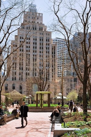 Boston, USA - April 28, 2015: People at Post Office Square and Skyline with Skyscrapers of downtown Boston, MA in USA.のeditorial素材