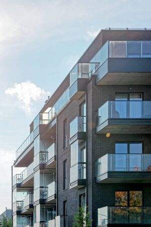 Fragment of Modern glass architecture of residential building. And outdoor facilities.の写真素材