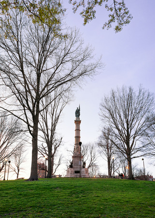 Soldiers and Sailors Monument at Boston Common public park in Boston, MA, United States. In the evening. People on the backgroundの写真素材