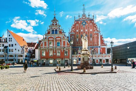 Riga, Latvia - September 3, 2014: House of Blackheads and people on the Square in the historical center in the old town of Riga, Latvia.のeditorial素材