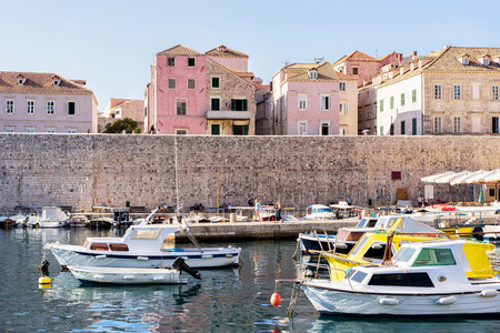 Dubrovnik, Croatia - August 19, 2016: Old port with people and boats in Adriatic Sea in Dubrovnik, Croatia.のeditorial素材