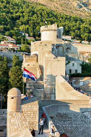 Dubrovnik, Croatia - August 19, 2016: Old City Walls and Fortress Minceta at Dubrovnik, in Croatia. People on the backgroundのeditorial素材