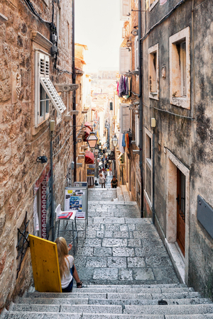 Dubrovnik, Croatia - August 20, 2016: People at tight street with steps in the Old town of Dubrovnik, in Croatiaのeditorial素材