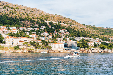 Dubrovnik, Croatia - August 19, 2016: Water Ferry with people at Dubrovnik coast in the Adriatic Sea, Croatiaのeditorial素材