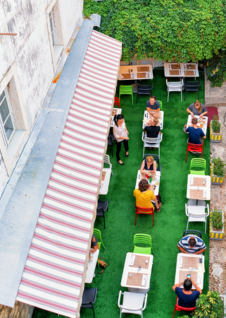 Dubrovnik, Croatia - August 19, 2016: People at Open Street terraced restaurant in Dubrovnik, in Croatia. View from the defensive city walls.のeditorial素材
