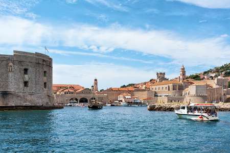 Dubrovnik, Croatia - August 19, 2016: Sailing boats with people at St John Fort and the Old port in the Adriatic Sea in Dubrovnik, Croatiaのeditorial素材