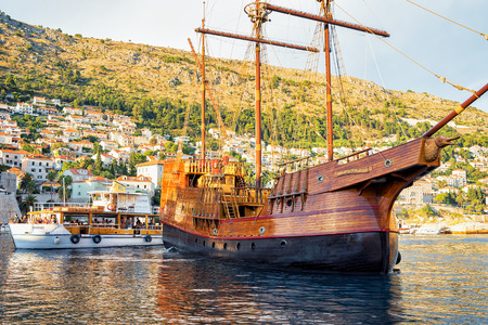 Dubrovnik, Croatia - August 18, 2016: Wooden ship at the Old port in the Adriatic Sea of Dubrovnik, Croatia.のeditorial素材