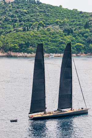 Black sailing ship at Lokrum Island in the Adriatic Sea, Dubrovnik, Croatiaの写真素材