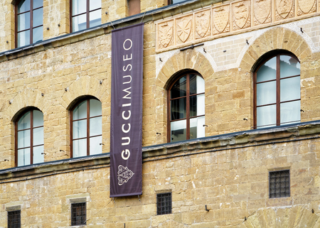 Florence, Italy - October 17, 2016: Gucci Museo Sign on street shop window, Florence, Italy.のeditorial素材