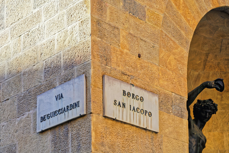 Via De Guicciardini and Borgo San Iacopo Street sign on the wall, Florence, Tuscany, Italyの写真素材