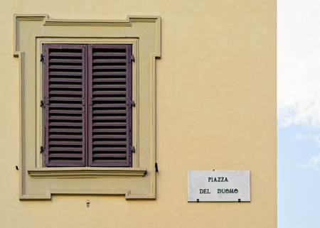 Plazza del Duomo Street sign on the wall in Florence, Tuscany, Italyの写真素材