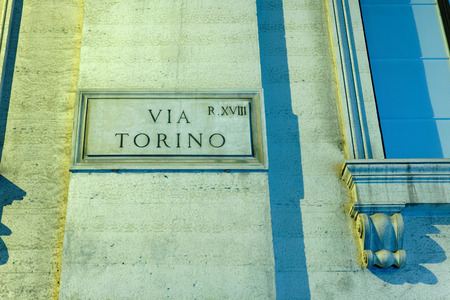 Via Torino street sign on the wall in Rome, Italyの写真素材
