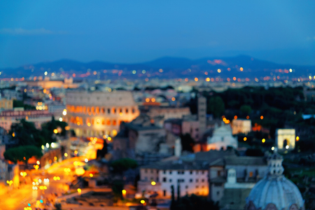 Via dei Fori Imperiali and Colosseum in Rome, Italy. Illuminated at night. Special blurの写真素材