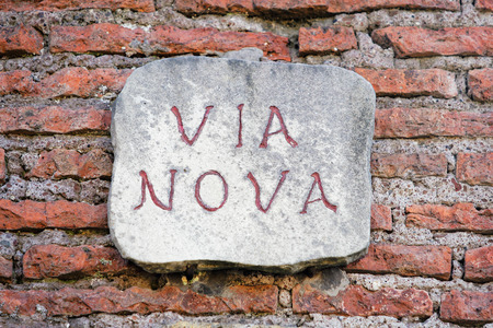 Via Nova sign on the brick wall in Rome, Italyの写真素材