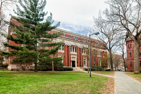 Cambridge, USA - April 29, 2015: Emerson Hall at Harvard Yard of Harvard University in Cambridge, Massachusetts, MA, America. People on the backgroundのeditorial素材