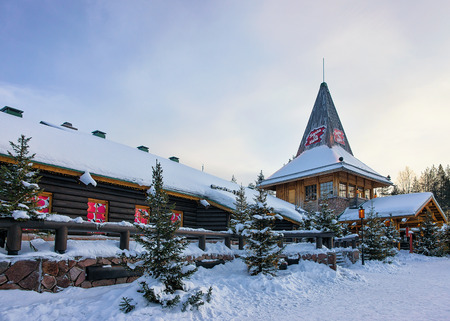 Rovaniemi, Finland - March 5, 2017: Santa Claus Office in Santa Village with Christmas trees in Lapland, Finland, Scandinavia, on Arctic Circle in winter.のeditorial素材
