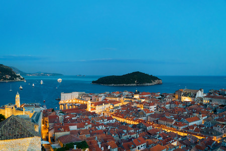 Dubrovnik old city, Lokrum Island, and Adriatic sea at night, Croatiaの写真素材