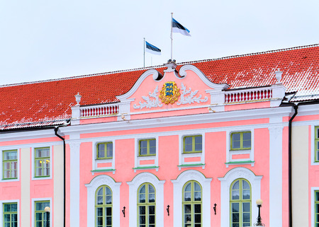 Parliament building with Estonian flag at the Old town of Tallinn, Estonia in winterの写真素材