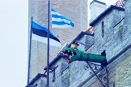 Dragon gargoyles on Town Hall of the Old city of Tallinn, Estonia in winterの写真素材