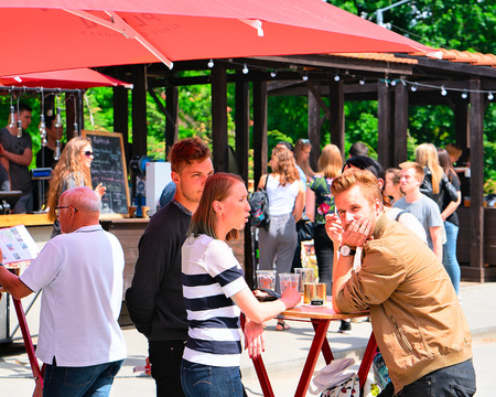 Vilnius, Lithuania - June 9, 2017: People drinking beer at Open Kitchen food festival in Vilnius, Lithuania.のeditorial素材