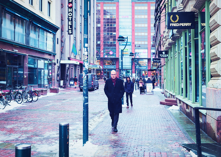 Helsinki, Finland - March 8, 2017: People on the street in the Old city of Helsinki, Finland in winter.のeditorial素材