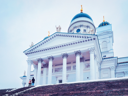 People at Helsinki Cathedral on Senate Square, Finland in winter.のeditorial素材