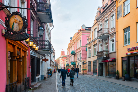Vilnius, Lithuania - April 1, 2017: Street view with tourists and the old house architecture in the historical center of Vilnius, Lithuaniaのeditorial素材
