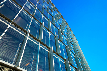 Vilnius, Lithuania - August 8, 2017: Low angle and the modern futuristic steel and glass skyscraper architectureのeditorial素材