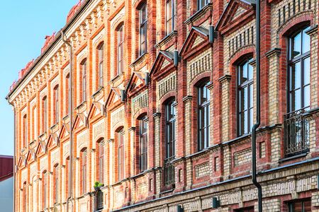 Red brick house in the Old city center in Vilnius, Lithuaniaの写真素材