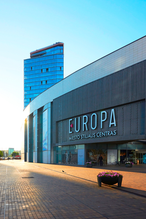 Vilnius, Lithuania - August 8, 2017: Street view with modern steel and glass skyscrapers reflecting the blue sky while sunsetのeditorial素材