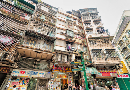 Macao, China - March 8, 2016:  Tourists at downtown in shopping center, Macao, China.のeditorial素材